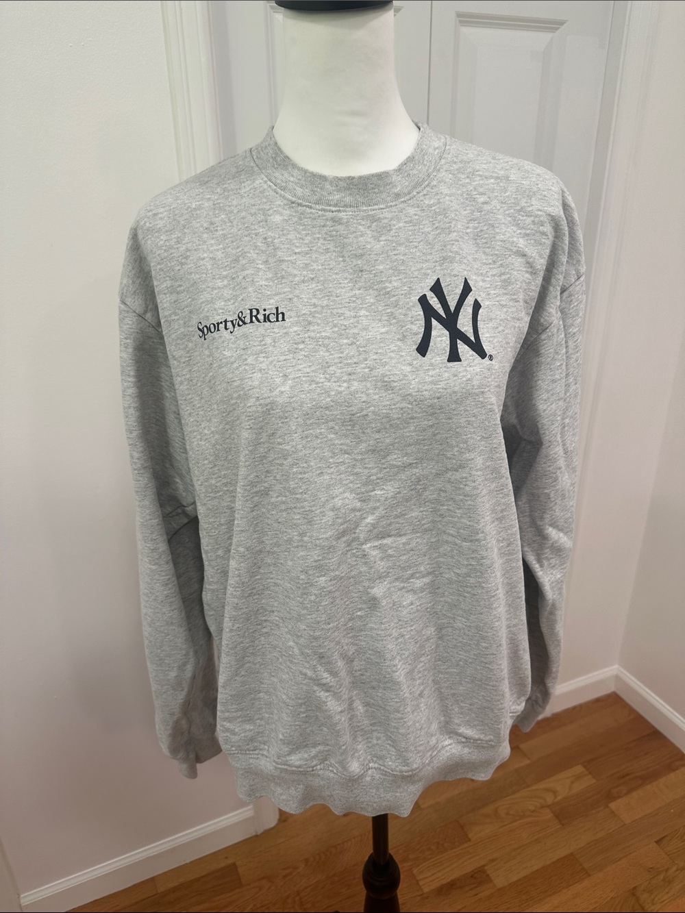Sporty & Rich Grey Crewneck Sweatshirt with Navy NY Emblem